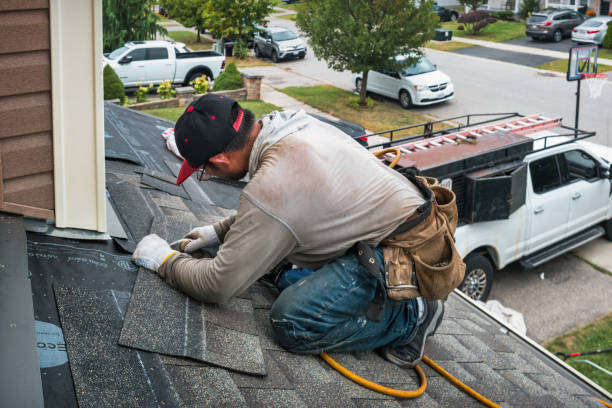Professional Gutter Repair And Installation technician working in Heber Springs, AR